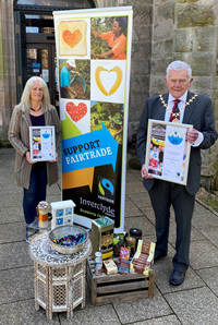 Provost Martin Brennan celebrating Inverclyde retaining its Fairtrade status with Morag Paul